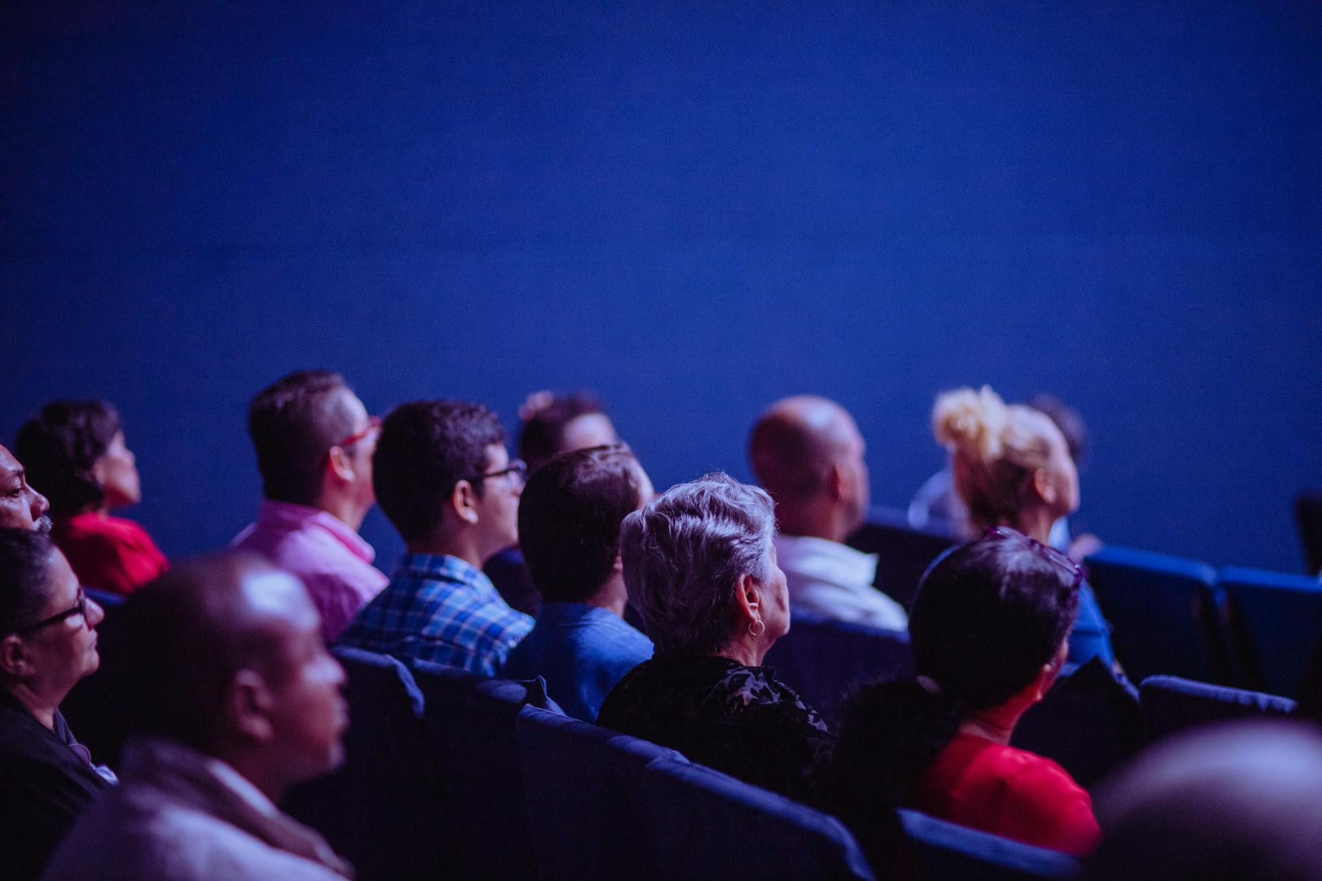 a room of people watching something